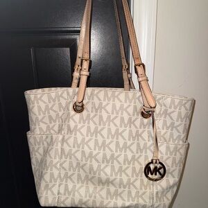 Michael Kors Cream Tote Bag with Monogram Pattern and Gold Hardware